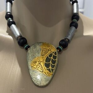 Elegant Gold and Silver Pendant Necklace